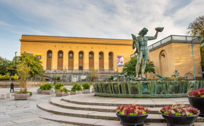 Gothenburg, Sweden - october 10 2019: Statue of Poseidon at Götaplatsen. Gothenburg art museum in the background